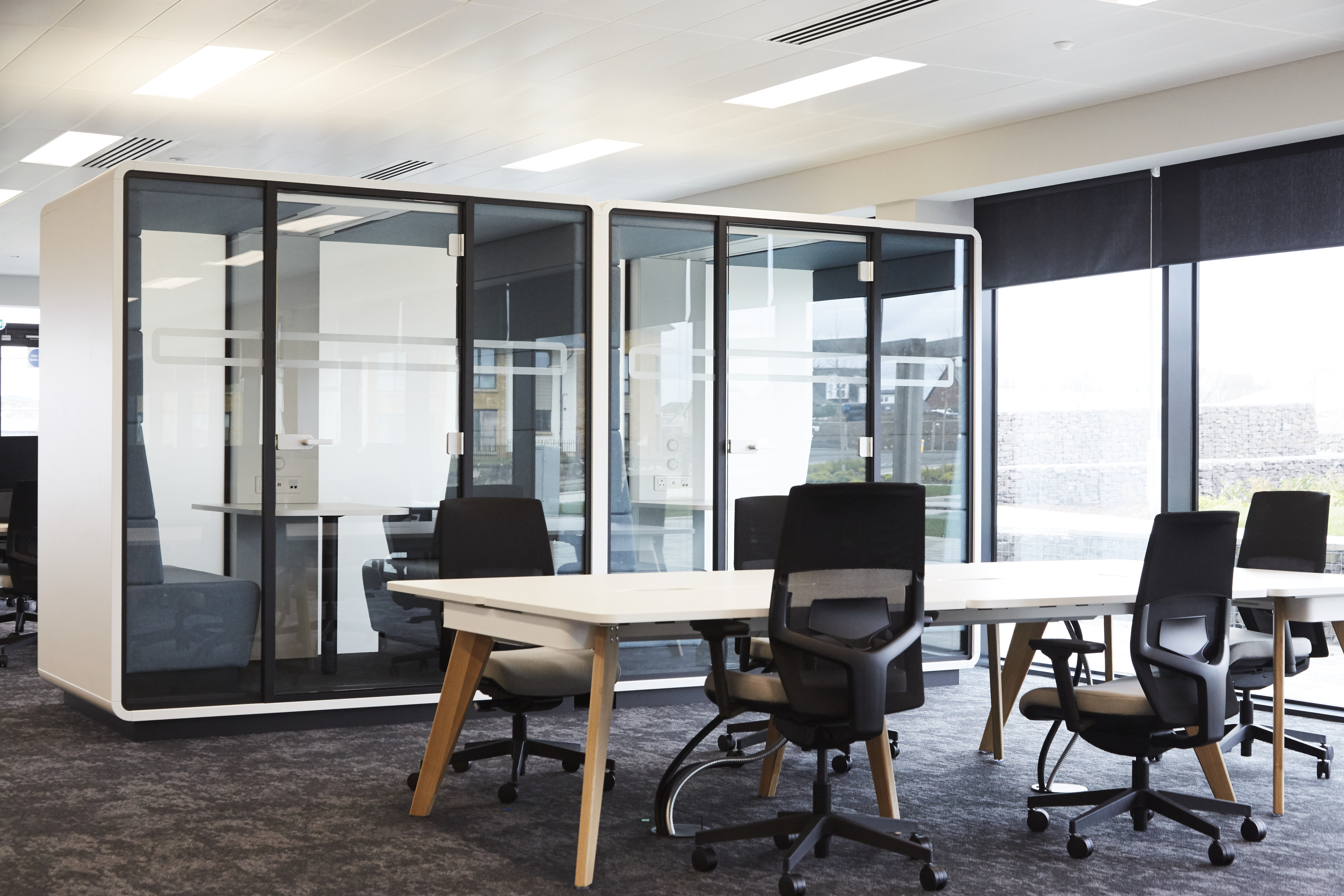 office building with hot desks and glazed pods