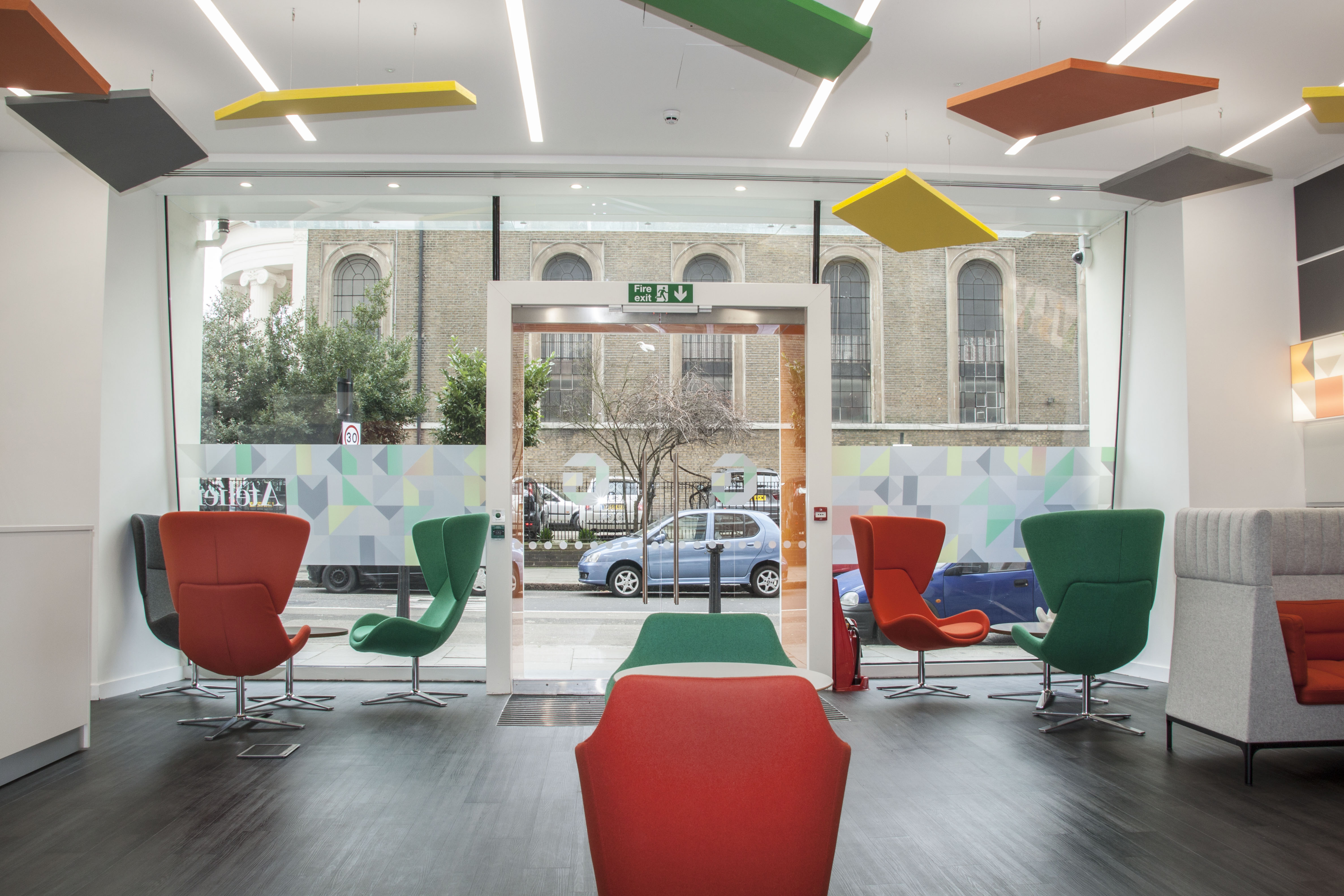 Bright reception room with colorful seating