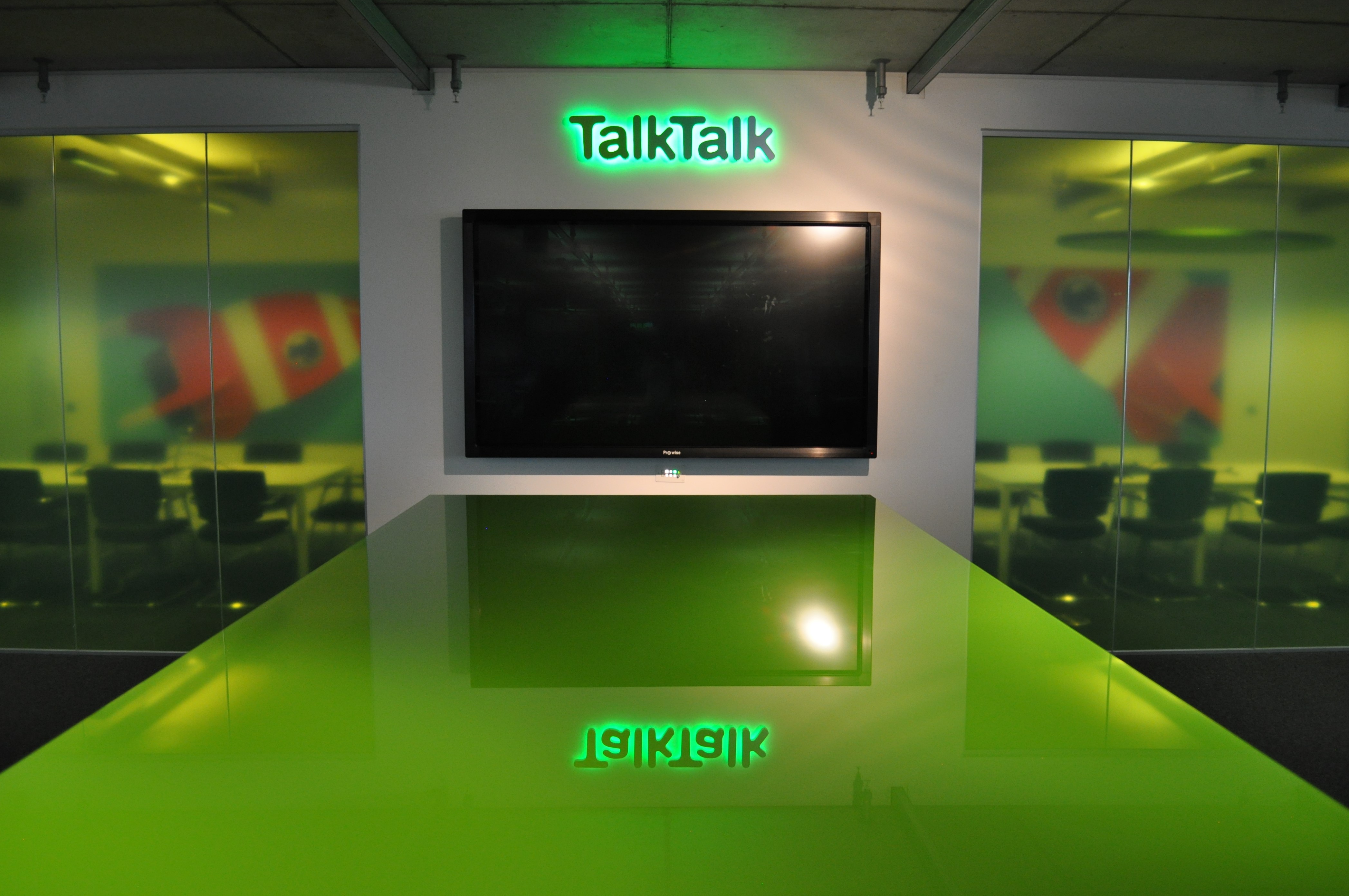 TalkTalk logo above a TV and table
